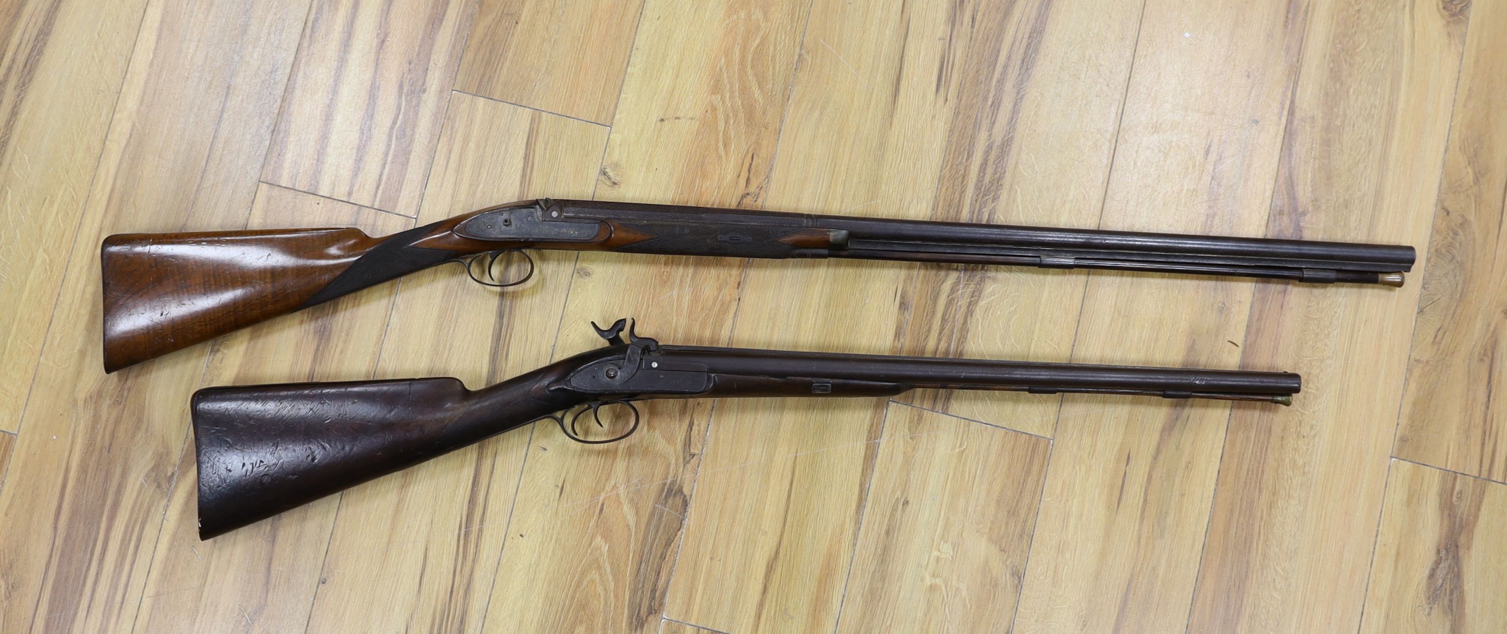 Two 19th century percussion muskets, 103cm. max., one double-barrelled